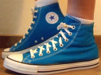 Cyan Space High Top Chucks  Wearing cyan space high tops, left side view 1.